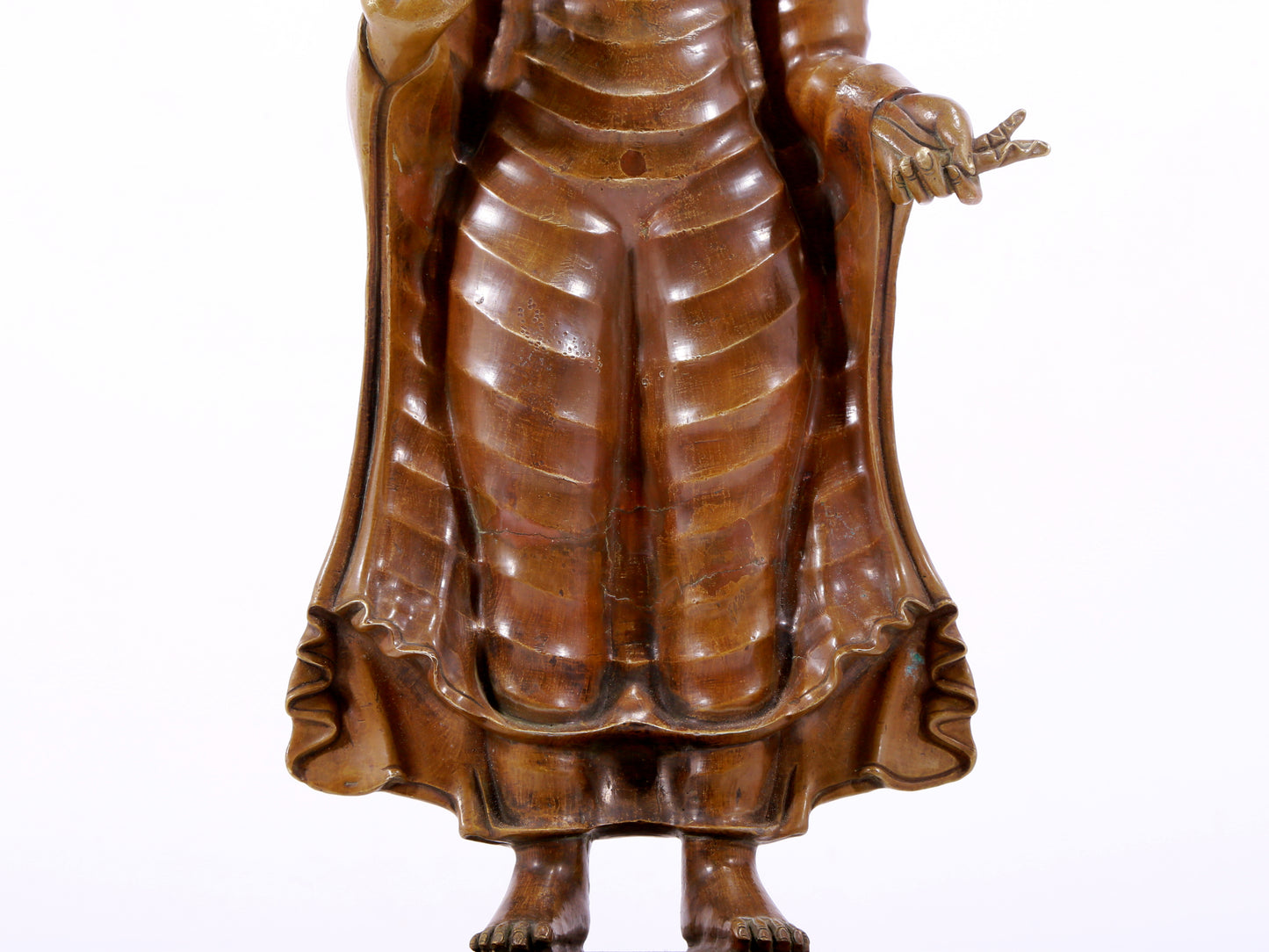 A solemn alloy copper statue of Gautama Buddha