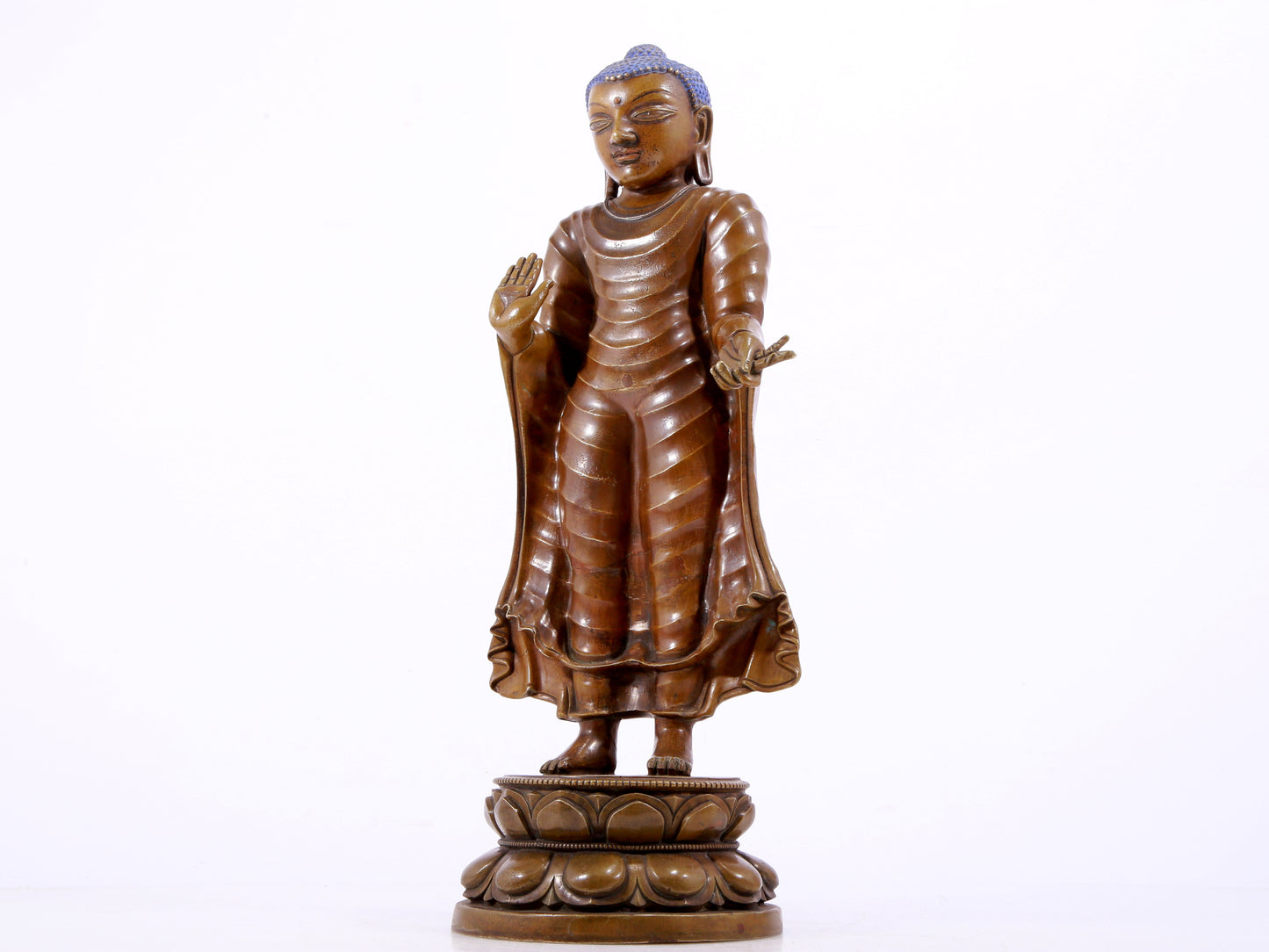 A solemn alloy copper statue of Gautama Buddha