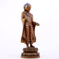 A solemn alloy copper statue of Gautama Buddha