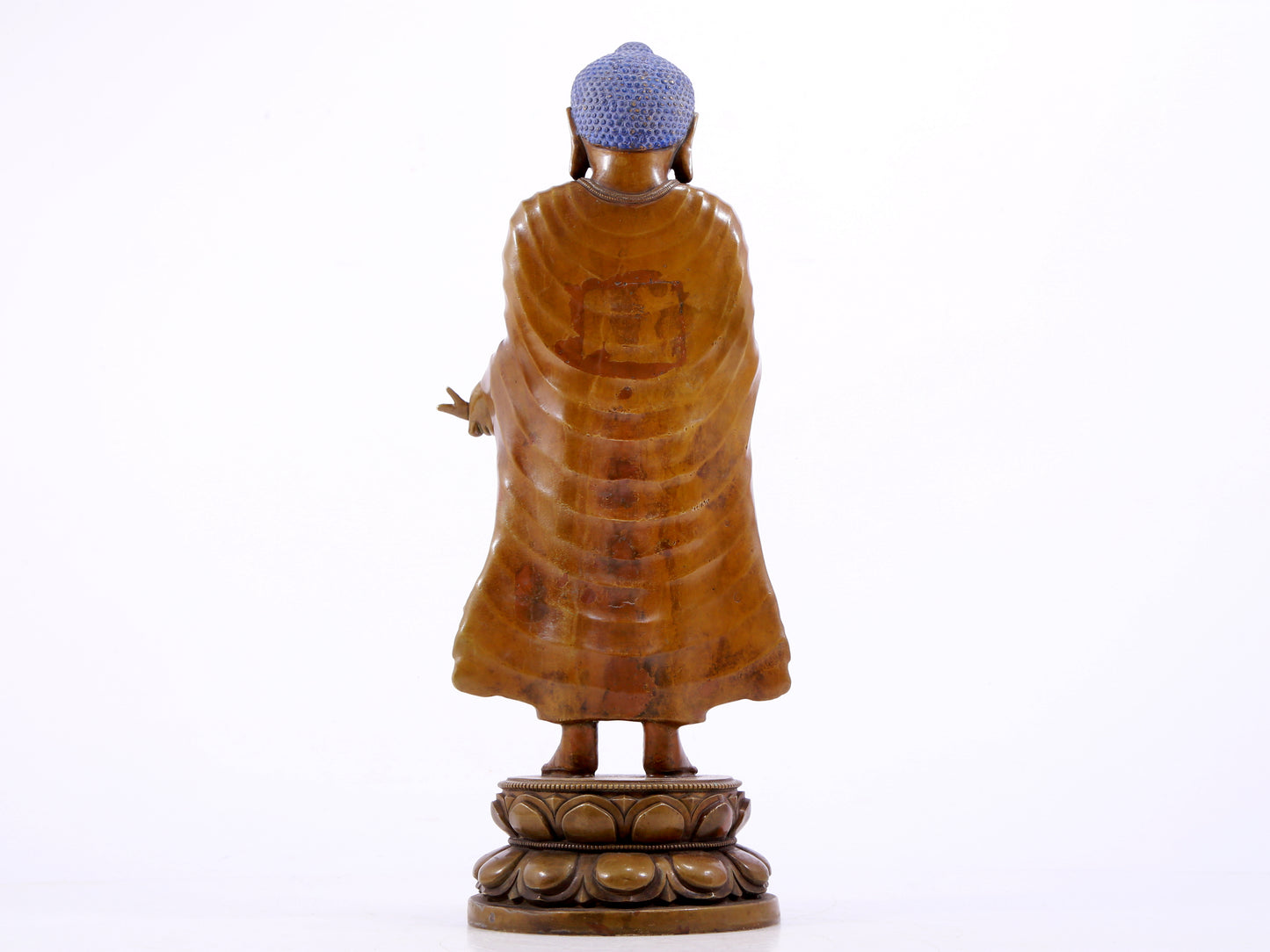 A solemn alloy copper statue of Gautama Buddha