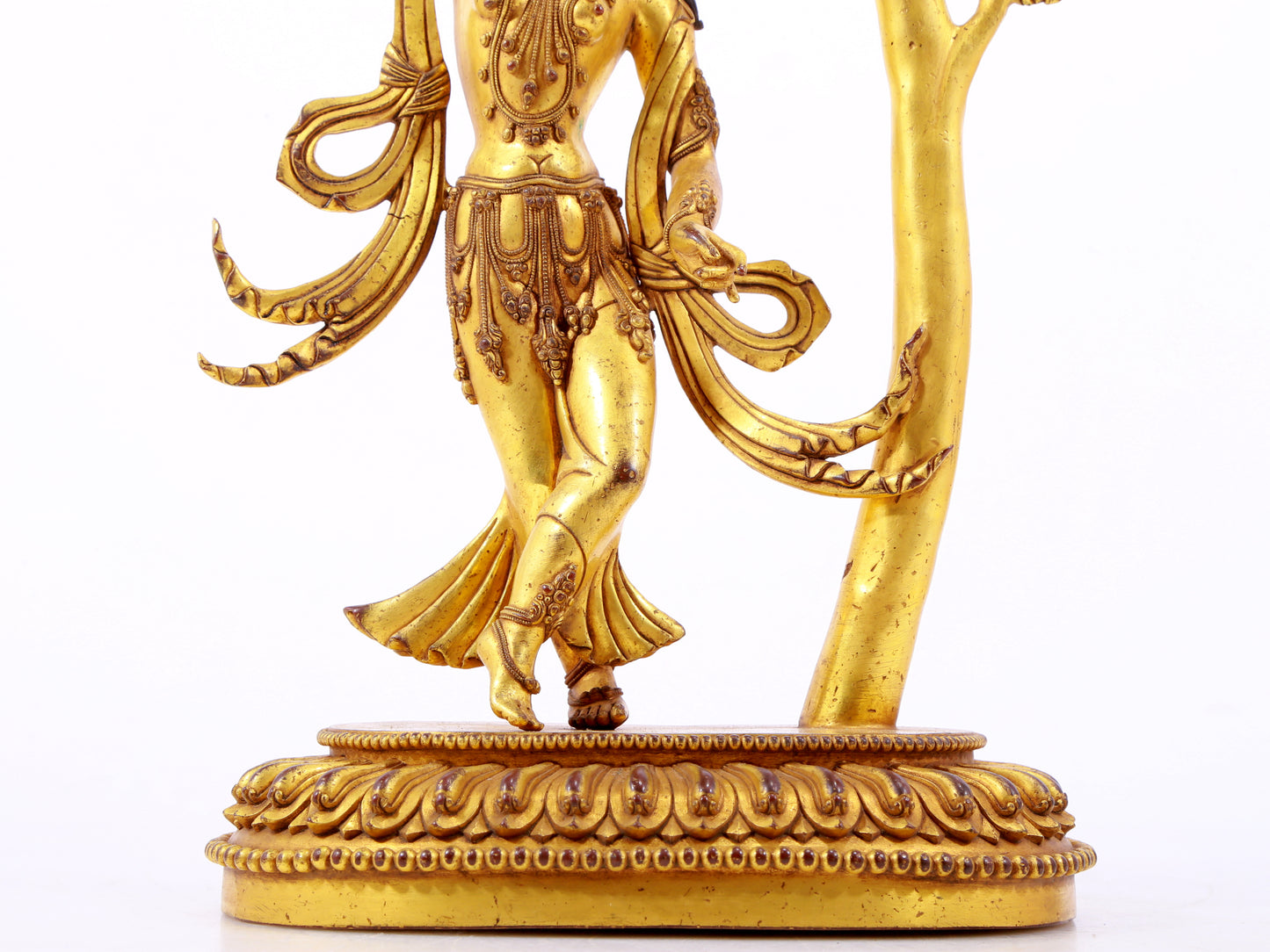 A solemn gilt bronze statue of Bodhisattva