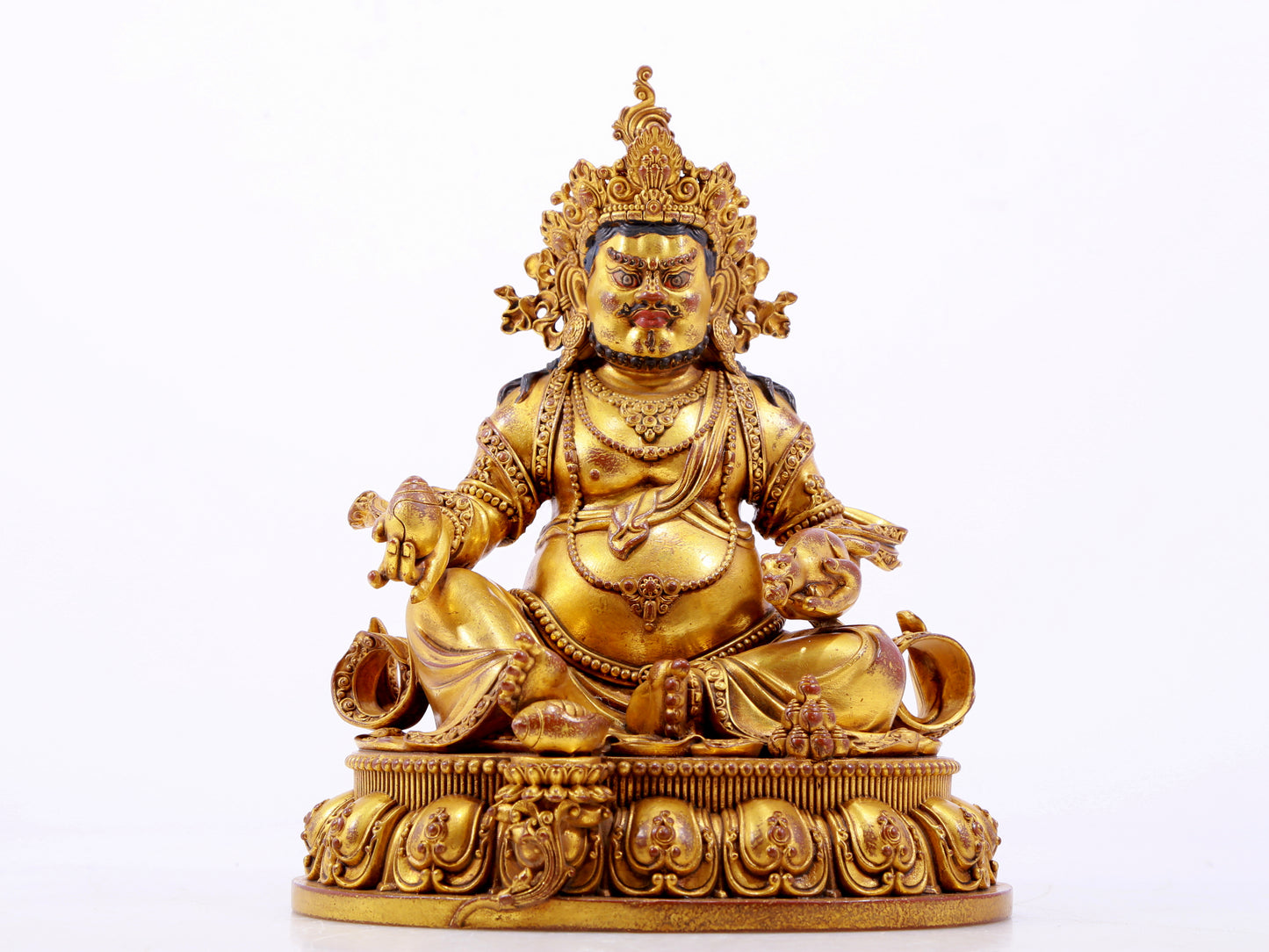 A solemn gilt bronze statue of the God of Wealth