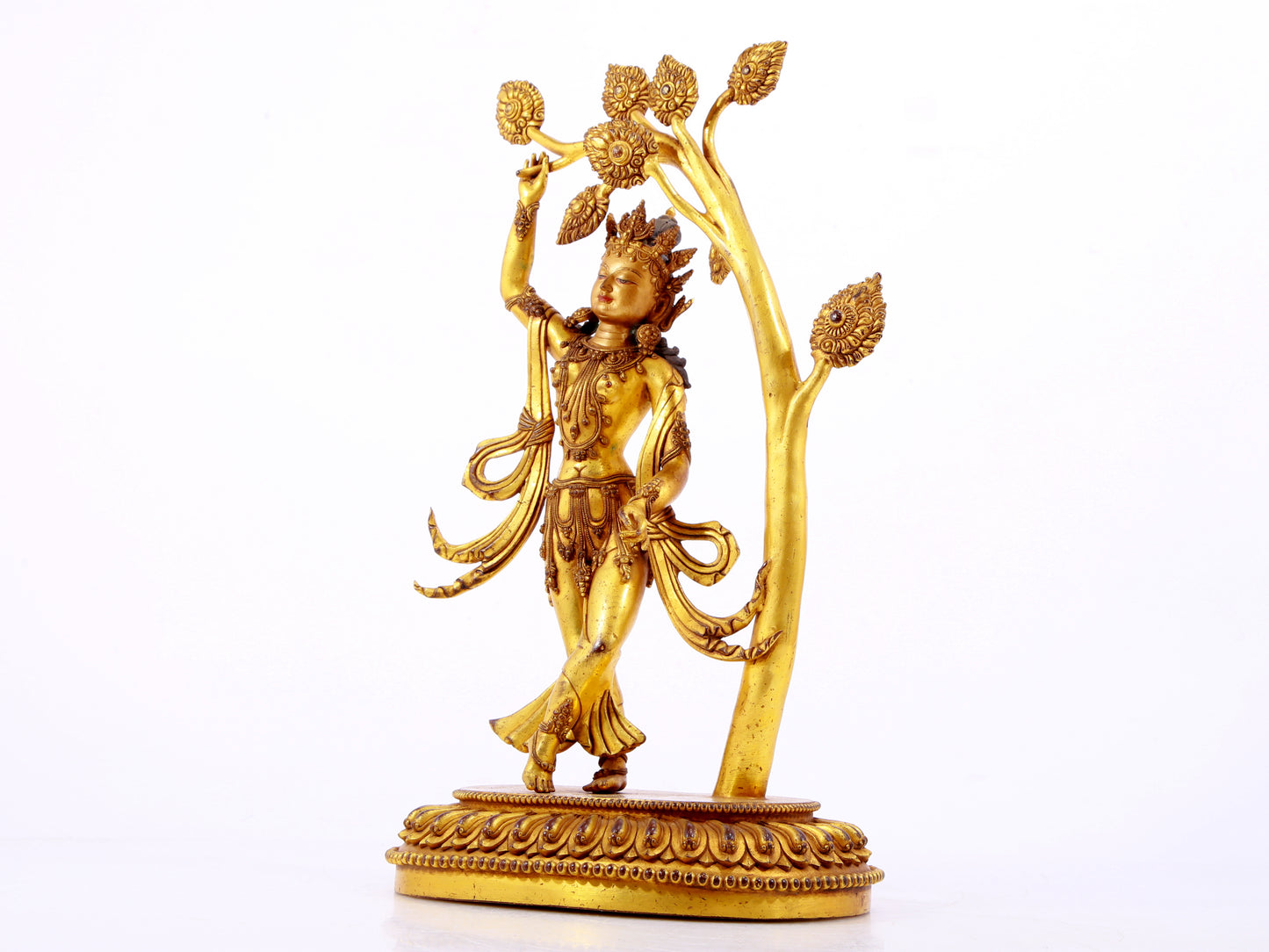 A solemn gilt bronze statue of Bodhisattva