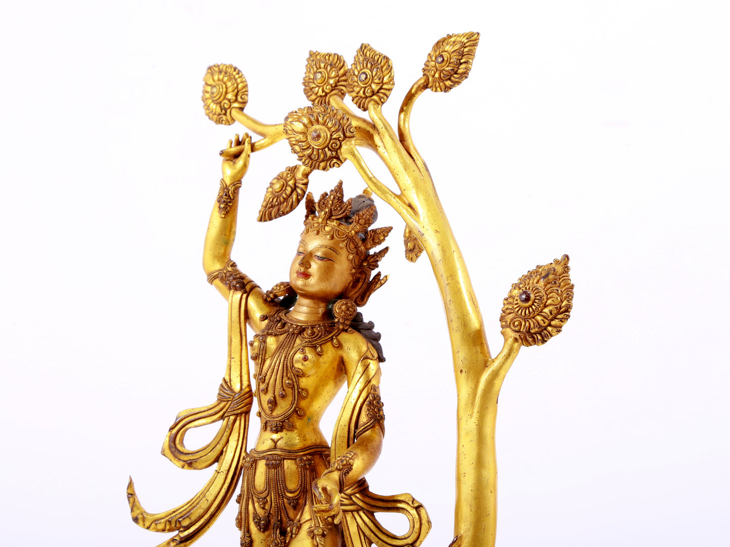 A solemn gilt bronze statue of Bodhisattva