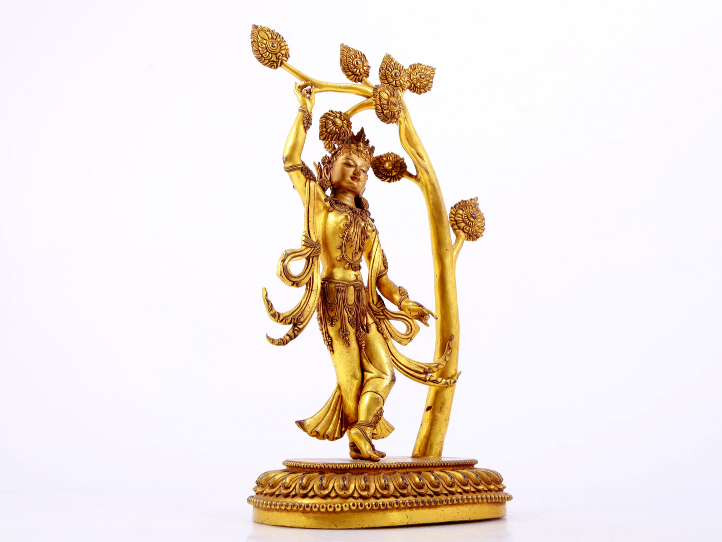 A solemn gilt bronze statue of Bodhisattva