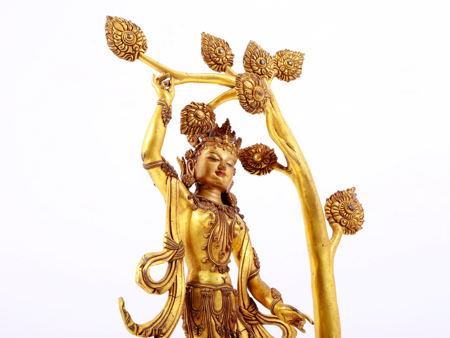 A solemn gilt bronze statue of Bodhisattva