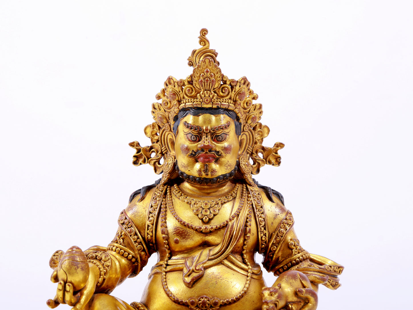 A solemn gilt bronze statue of the God of Wealth