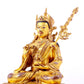 A solemn gilt bronze statue of Padmasambhava