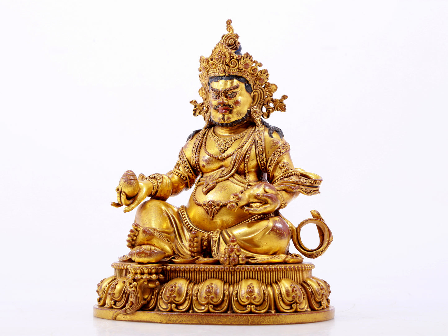 A solemn gilt bronze statue of the God of Wealth