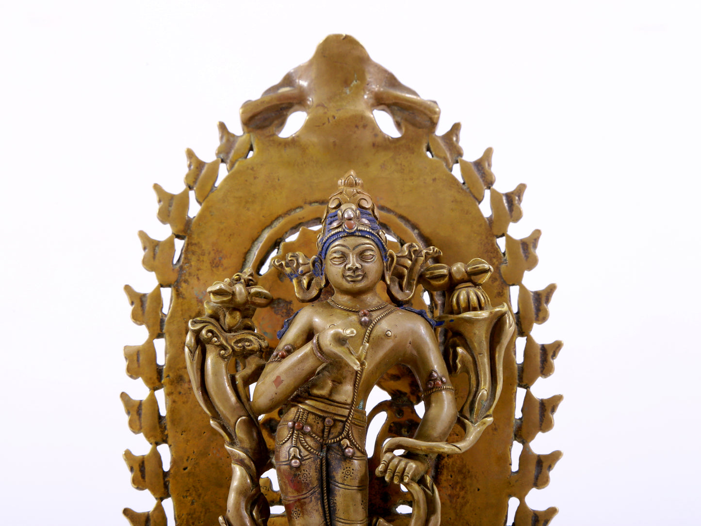 A majestic alloy copper inlaid silver standing statue of Tara