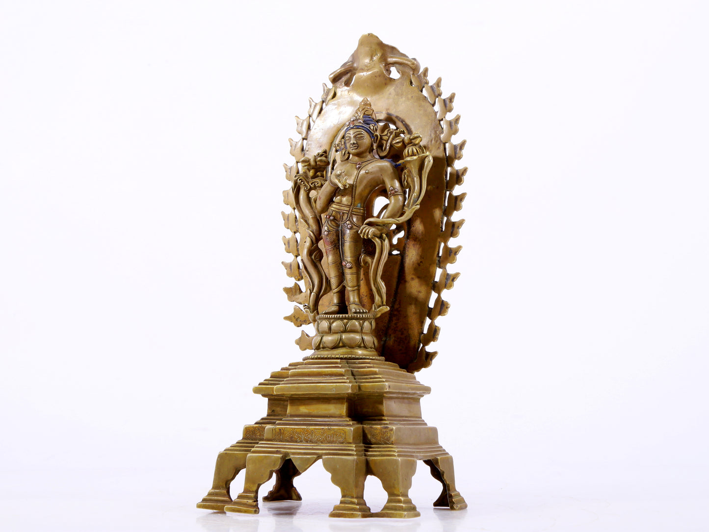 A majestic alloy copper inlaid silver standing statue of Tara