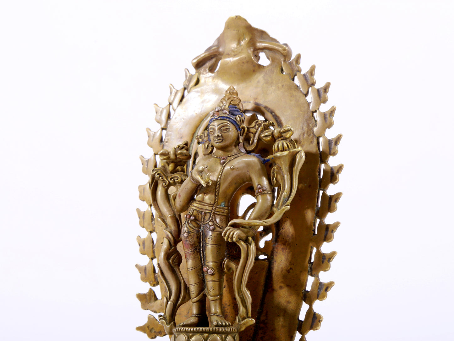 A majestic alloy copper inlaid silver standing statue of Tara