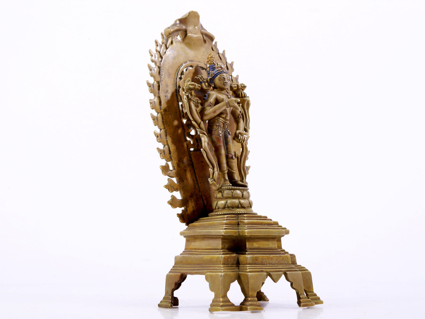 A majestic alloy copper inlaid silver standing statue of Tara