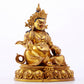 A solemn gilt bronze statue of the God of Wealth