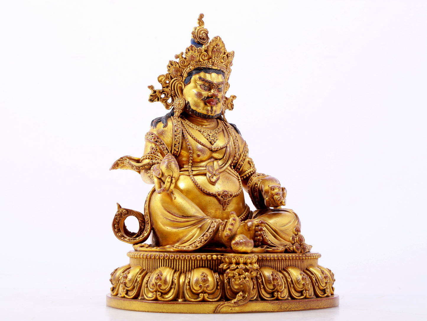 A solemn gilt bronze statue of the God of Wealth