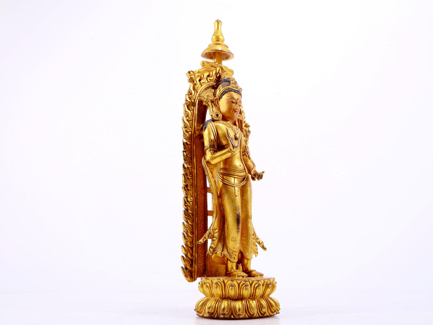 A majestic gilt bronze statue of Tara