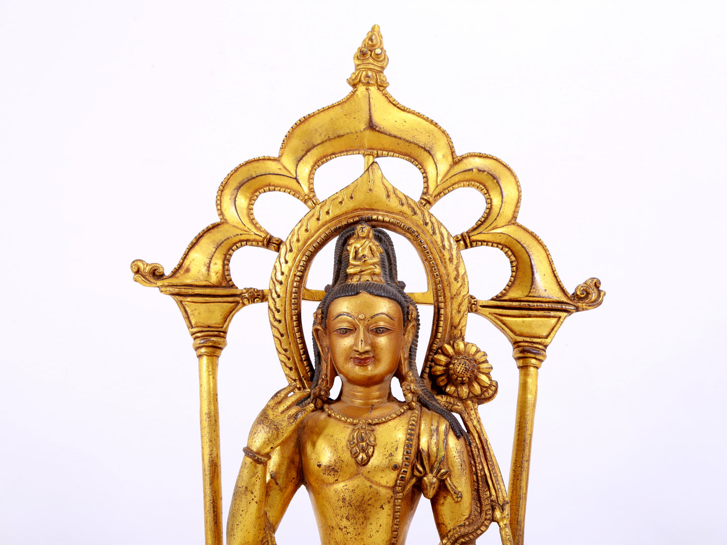 A majestic gilt bronze statue of green Tara