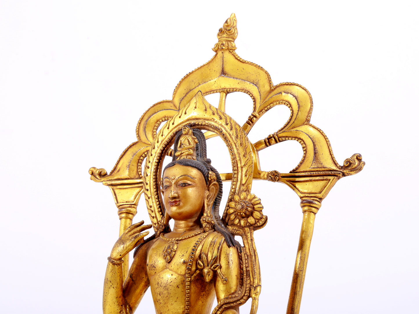 A majestic gilt bronze statue of green Tara