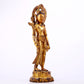 A solemn gilt bronze statue of Tara inlaid with hundreds of treasures