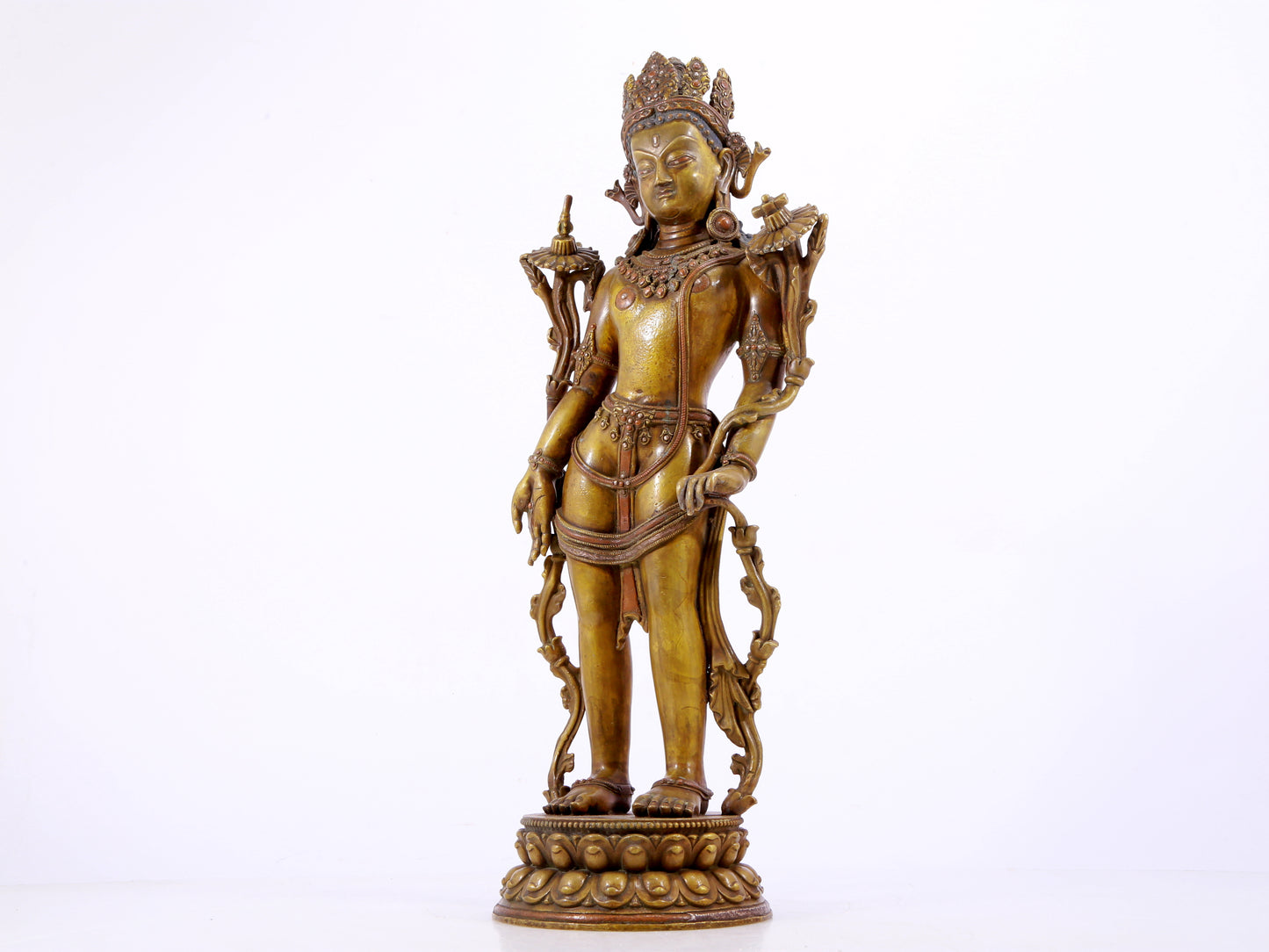 A majestic alloy copper inlaid silver standing statue of Tara