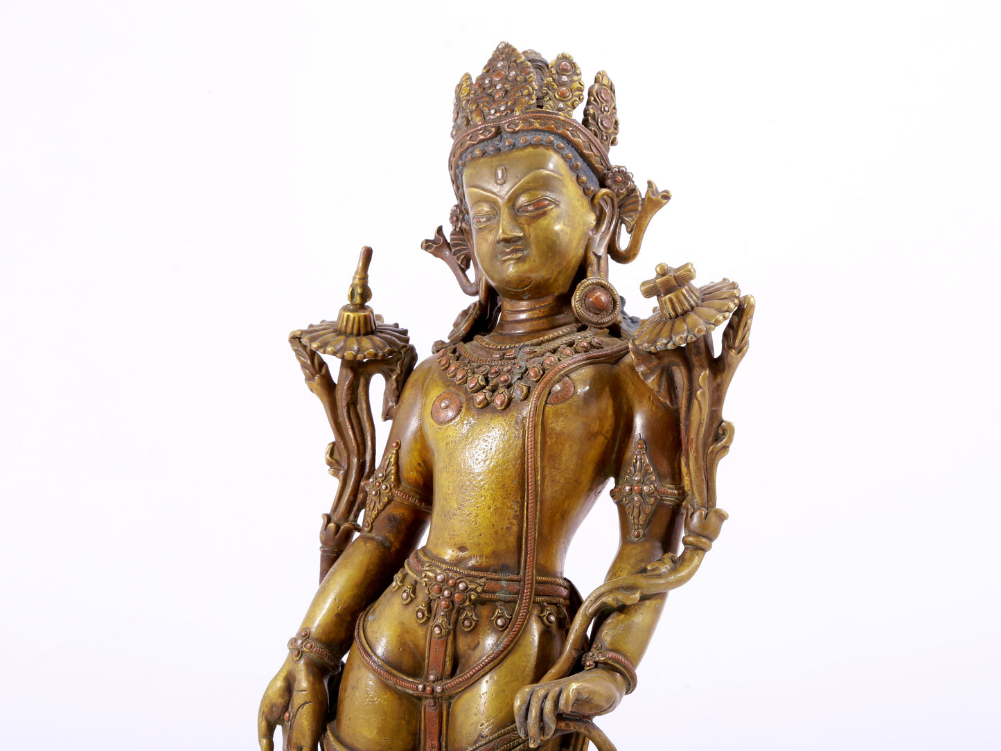 A majestic alloy copper inlaid silver standing statue of Tara