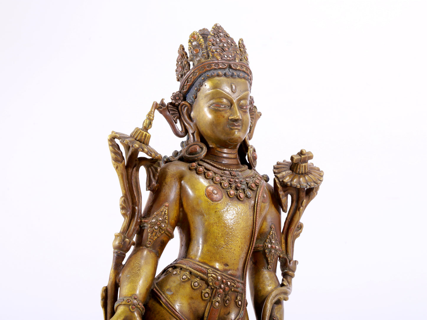 A majestic alloy copper inlaid silver standing statue of Tara