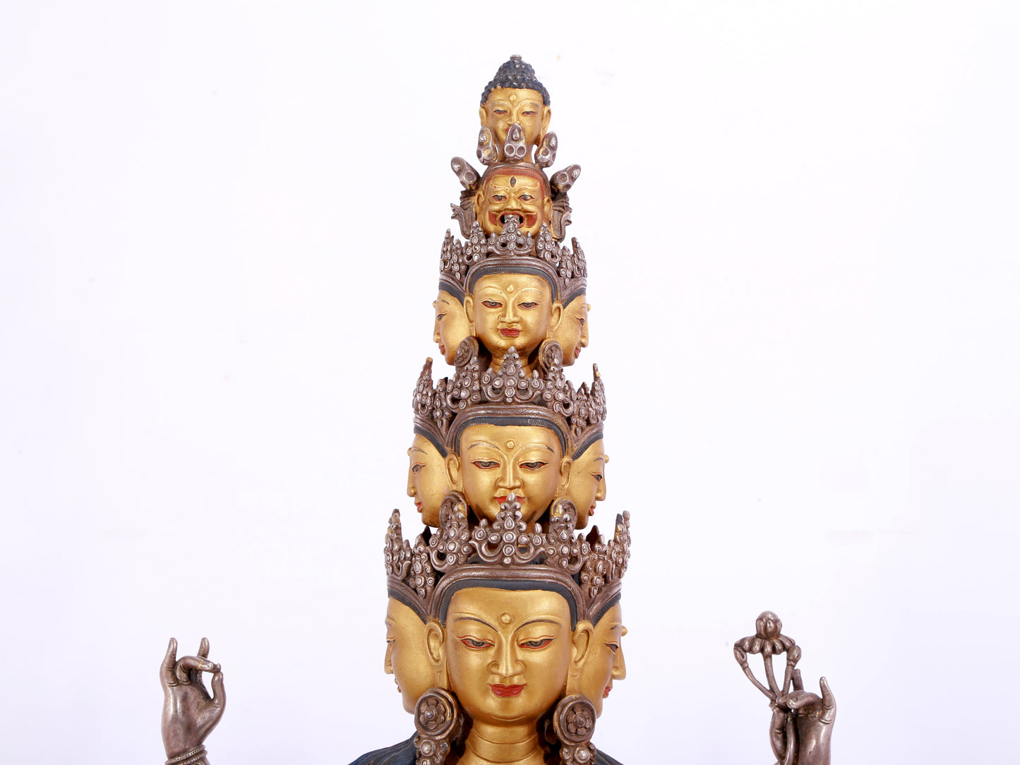 A majestic gilt bronze and silver statue of Avalokitesvara with Thousand Arms