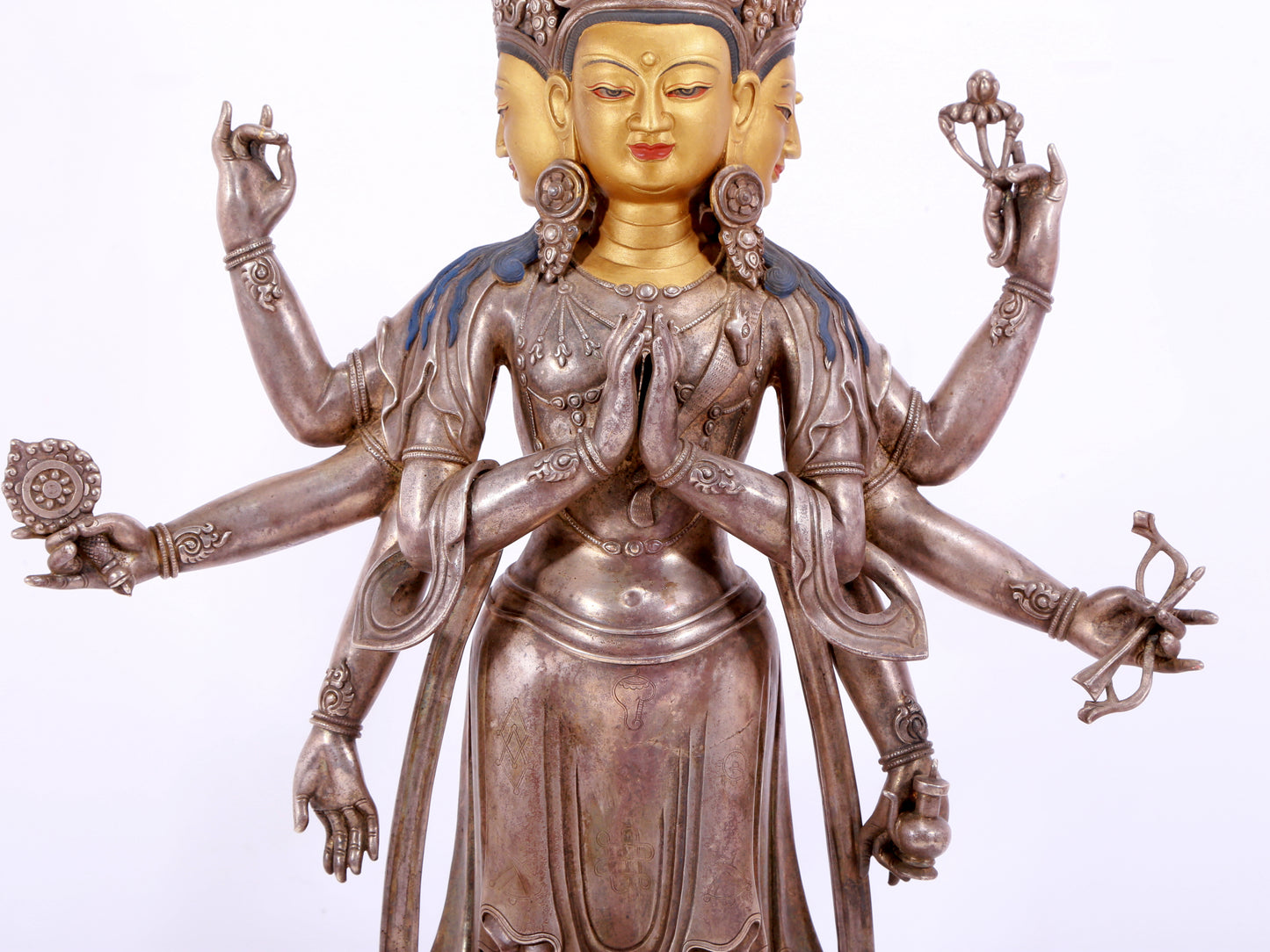 A majestic gilt bronze and silver statue of Avalokitesvara with Thousand Arms