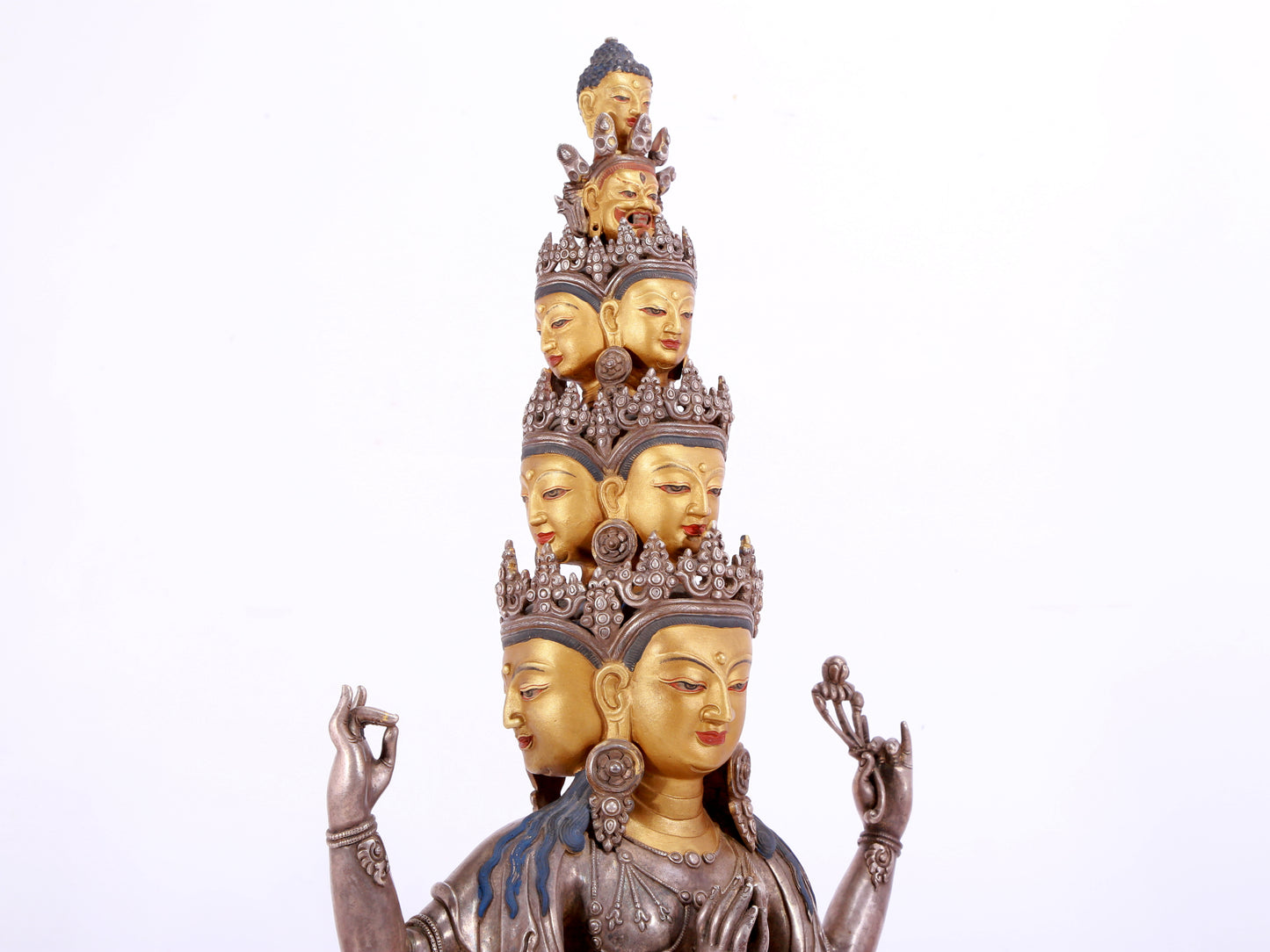 A majestic gilt bronze and silver statue of Avalokitesvara with Thousand Arms