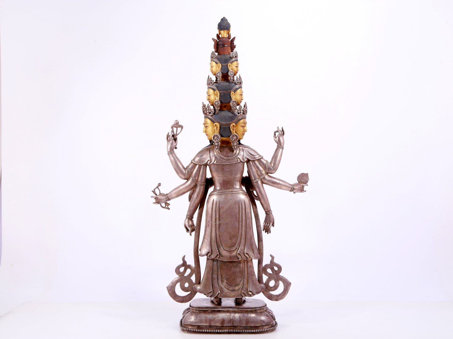 A majestic gilt bronze and silver statue of Avalokitesvara with Thousand Arms