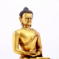 A majestic gilt bronze statue of Sakyamuni