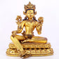 A solemn gilt copper inlaid turquoise green Tara statue