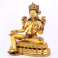 A solemn gilt copper inlaid turquoise green Tara statue