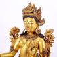 A solemn gilt copper inlaid turquoise green Tara statue