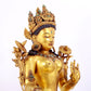 A solemn gilt copper inlaid turquoise green Tara statue