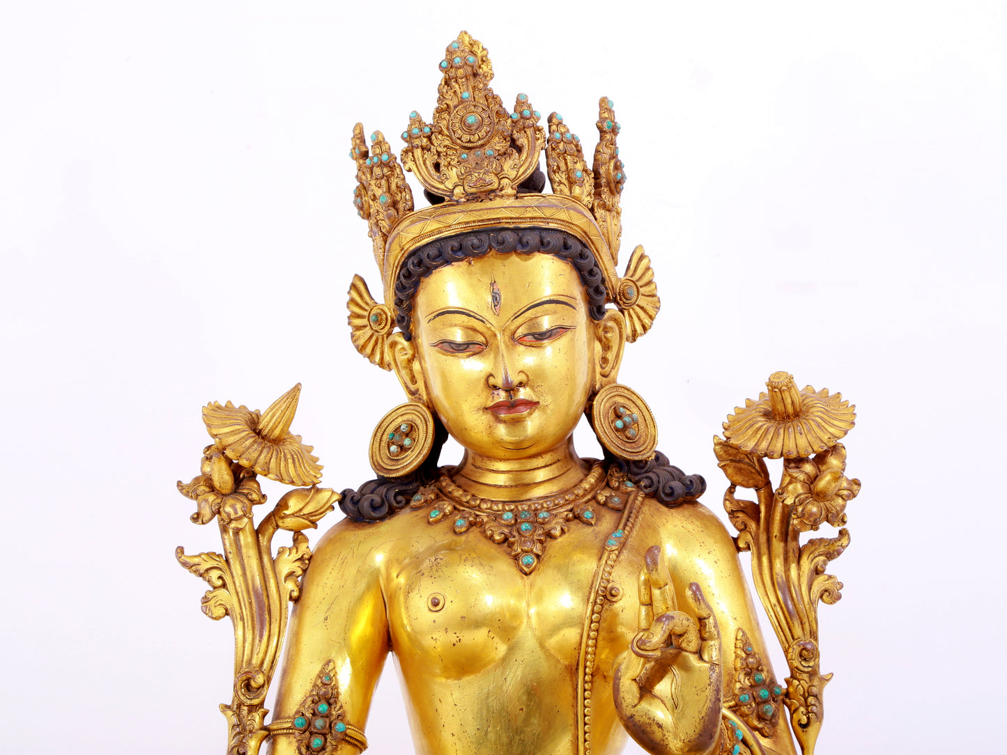 majestic gilt bronze statue of White Tara inlaid with turquoise