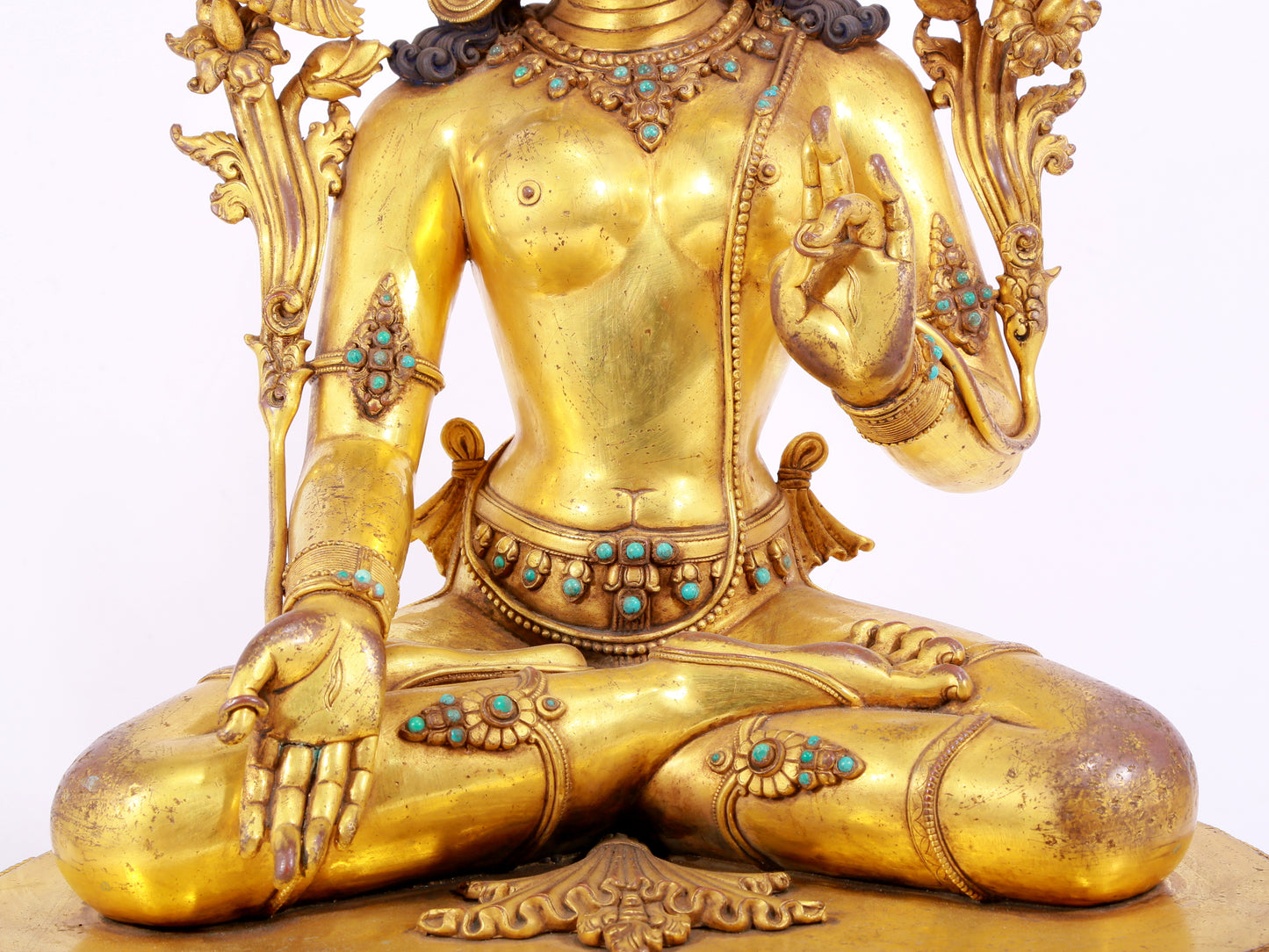 majestic gilt bronze statue of White Tara inlaid with turquoise