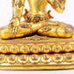 majestic gilt bronze statue of White Tara inlaid with turquoise