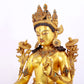 majestic gilt bronze statue of White Tara inlaid with turquoise