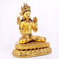 majestic gilt bronze statue of White Tara inlaid with turquoise