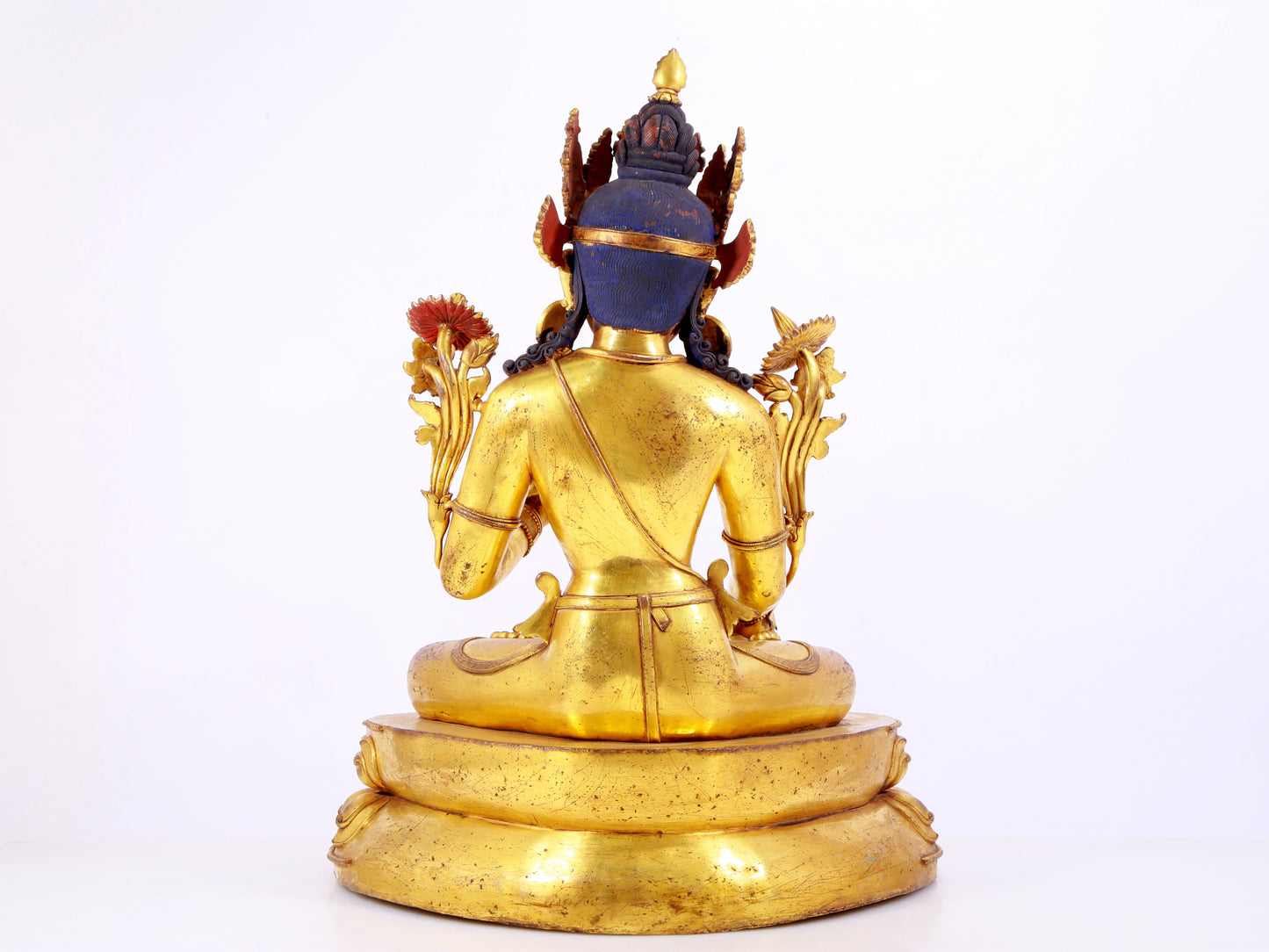 majestic gilt bronze statue of White Tara inlaid with turquoise