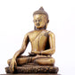 A solemn alloy copper statue of Gautama Buddha