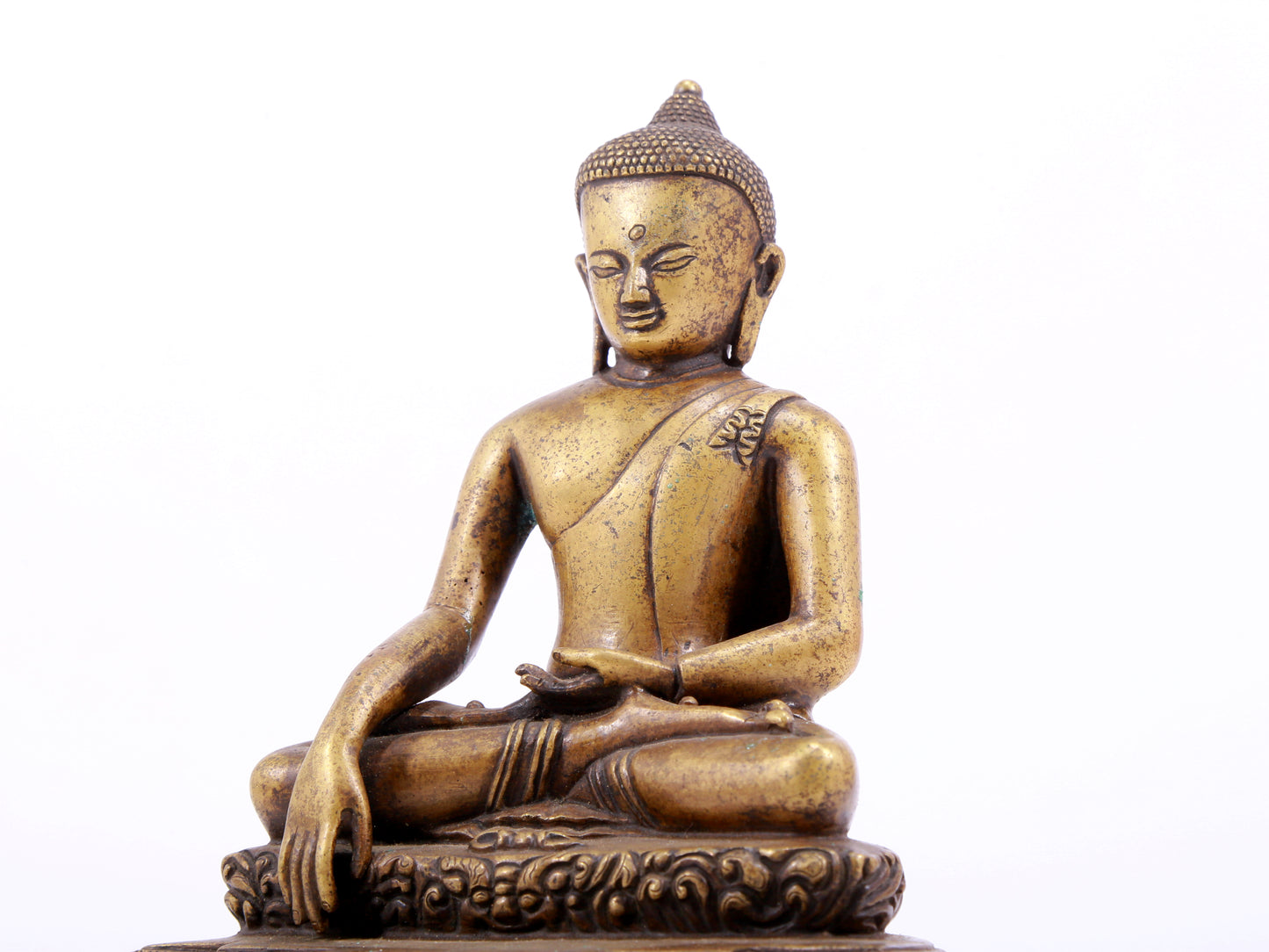 A solemn alloy copper statue of Gautama Buddha