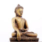 A solemn alloy copper statue of Gautama Buddha