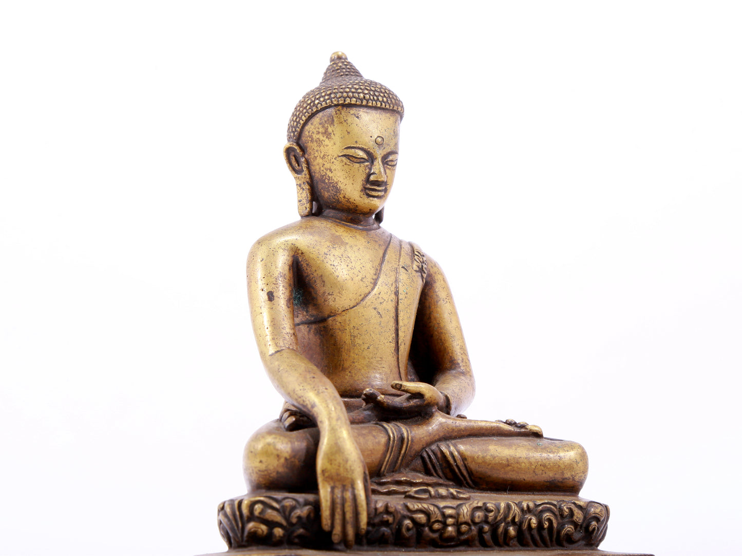 A solemn alloy copper statue of Gautama Buddha