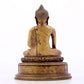 A solemn alloy copper statue of Gautama Buddha