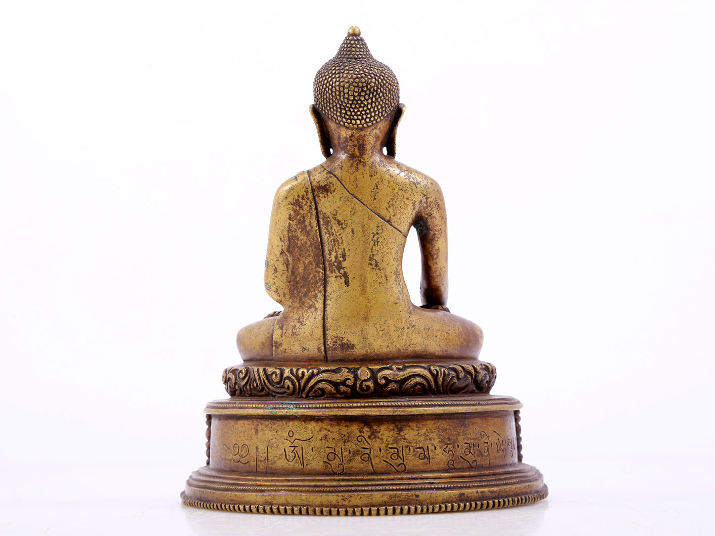 A solemn alloy copper statue of Gautama Buddha