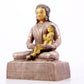 A solemn gilt bronze and silver figure inlaid with hundreds of treasures