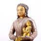 A solemn gilt bronze and silver figure inlaid with hundreds of treasures