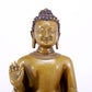 A solemn alloy copper inlaid silver statue of Gautama Buddha